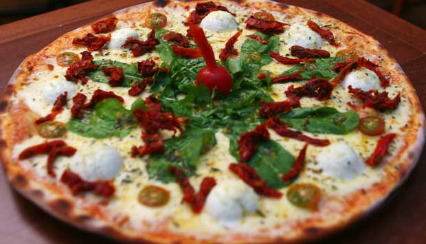 A novidade especial da casa para o dia da pizza é a burrata speciali (R$ 42,00).<br> A novidade especial da casa para o dia da pizza é a burrata speciali (R$ 42,00).<br>