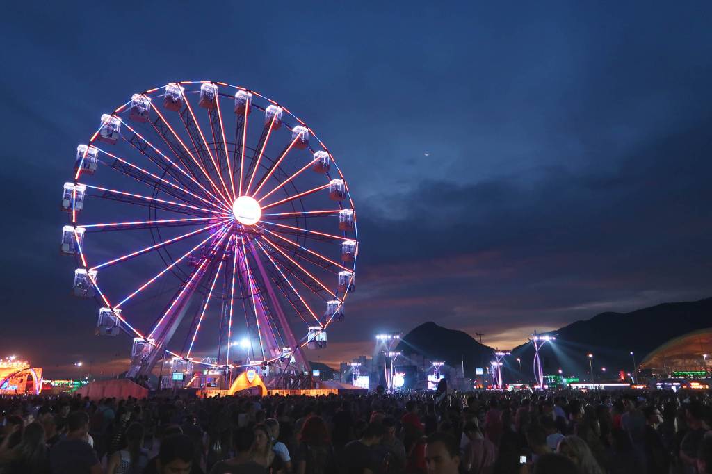Cidade dividida entre a alegria do Rock in Rio e tiros na Rocinha