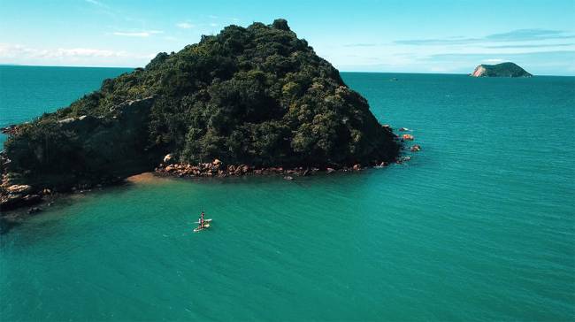 E a praia, com passeio de SUP. Experiência perfeita!