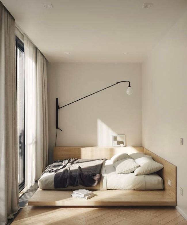 Estilo escandinavo A imagem mostra um quarto com cama e luminaria moderna