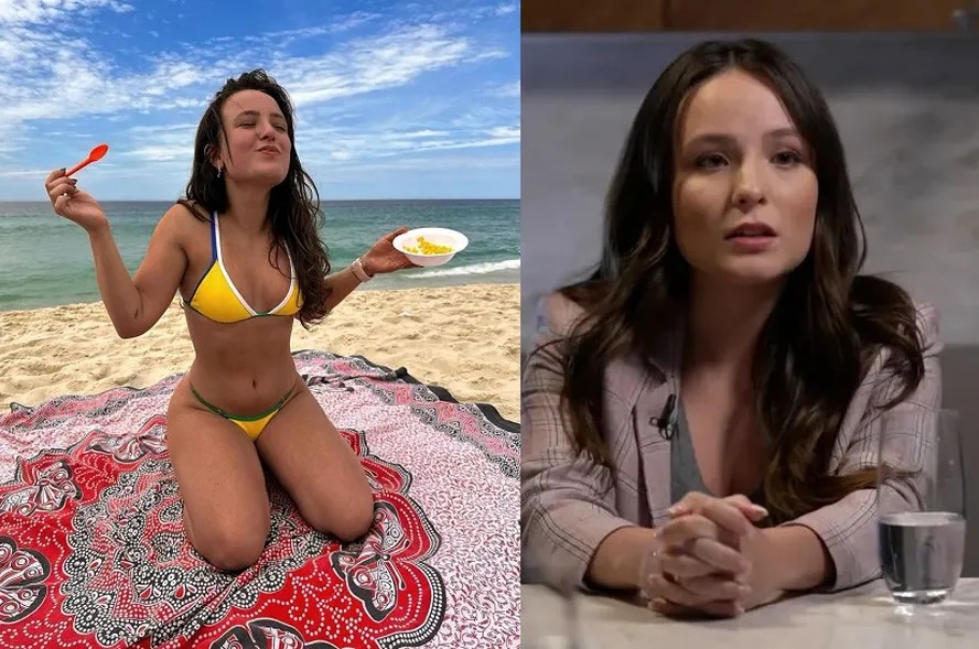 Foto mostra atriz comendo milho na praia usando biquini amarelo