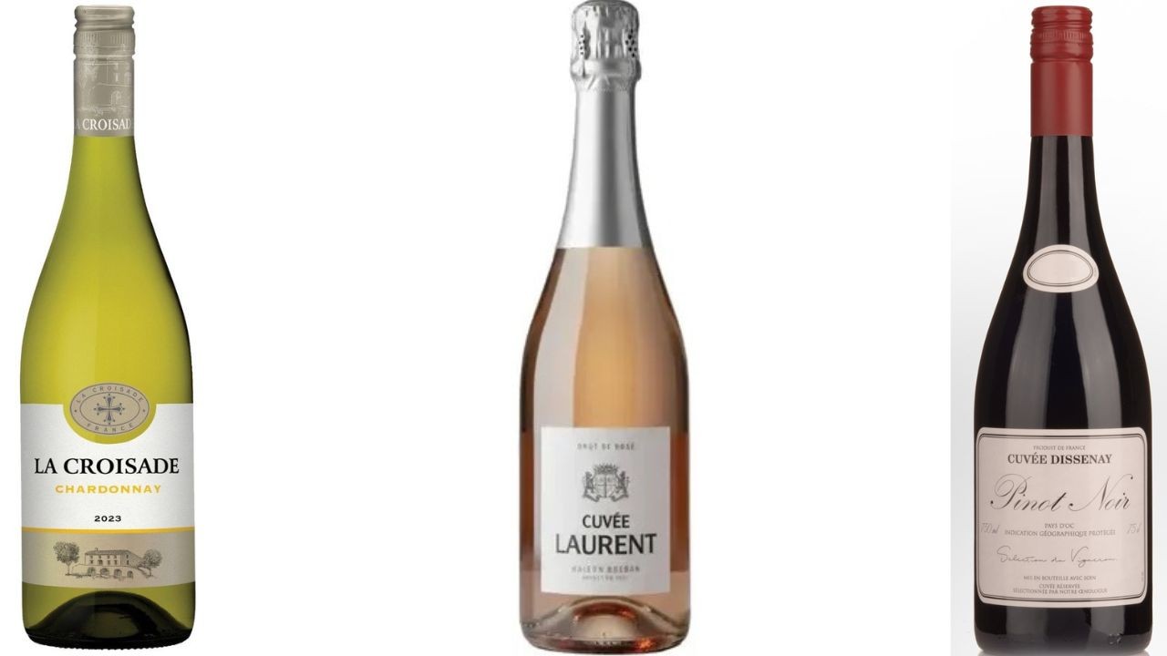 Tr&ecirc;s garrafas de vinho em fundo branco: um vinho branco La Croisade Chardonnay, um espumante ros&eacute; Cuv&eacute;e Laurent e um vinho tinto Cuv&eacute;e Dissenay Pinot Noir