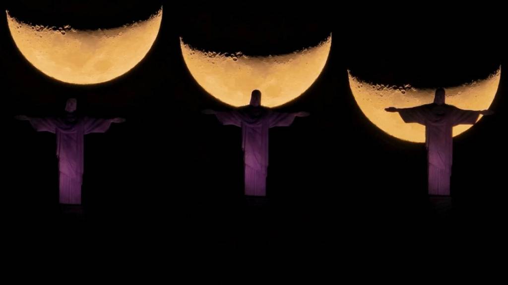 Fotógrafo faz registro estonteante da lua atrás do Cristo Redentor